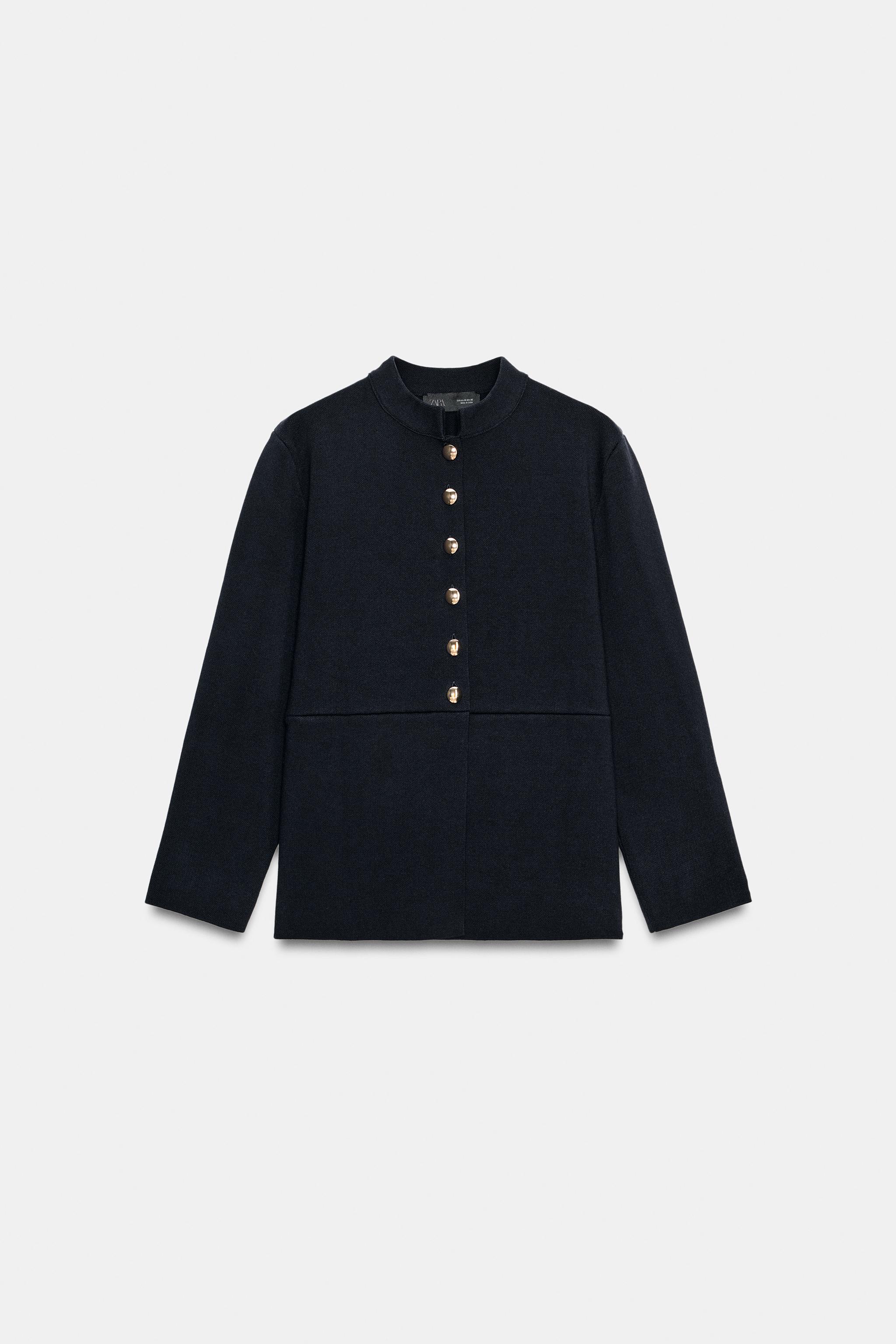 GILET EN MAILLE PEPLUM BOUTONS DORÉS